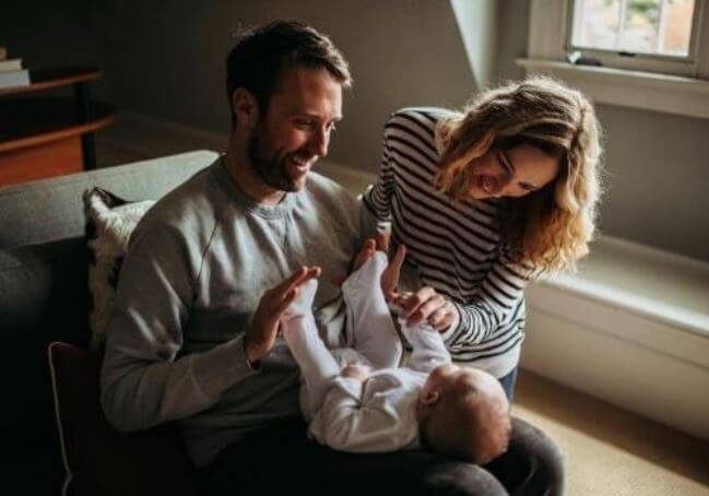 Stephen O'Reilly with his wife Kristen Connolly with their baby.